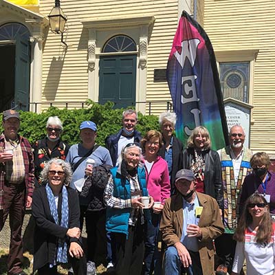 group of congregation members on steps of church