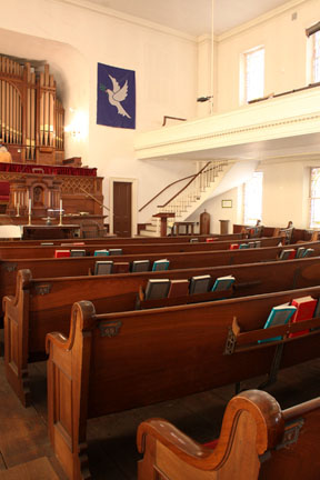 interior of the main sanctuary of gloucester unitarian united church