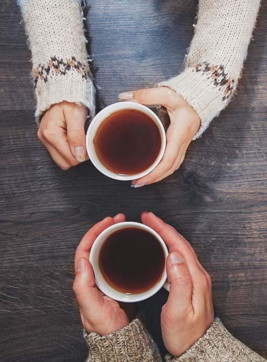 two friends enjoying tea