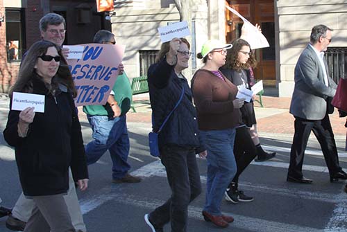 rev. janet marching in a demonstration #icantkeepquiet