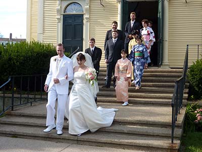 wedding party leaving the church after ceremony